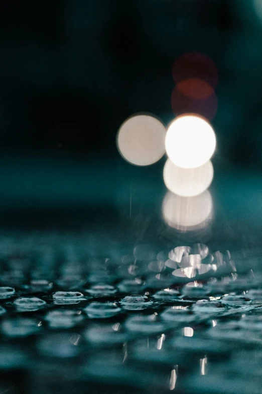 a close up of a laptop keyboard on a table, unsplash, photorealism, ultra detailed rain drops, thin glowing lights, 4 k film still, multiple stories