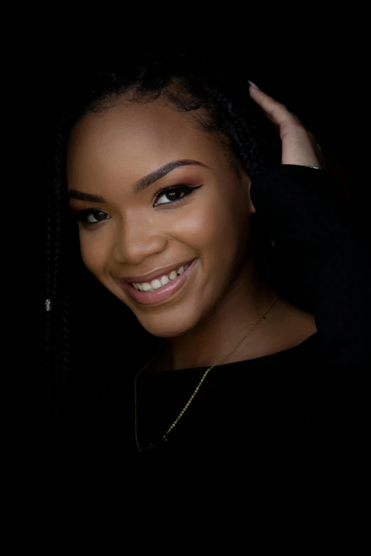a woman posing for a picture in front of a black background, by Chinwe Chukwuogo-Roy, young female face, professional photo-n 3, 1 6 years old, black hair in braids