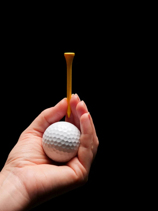 a person holding a golf ball in their hand, an album cover, by Matthias Stom, unsplash, holding a yellow toothbrush, 15081959 21121991 01012000 4k, square, giant wooden club