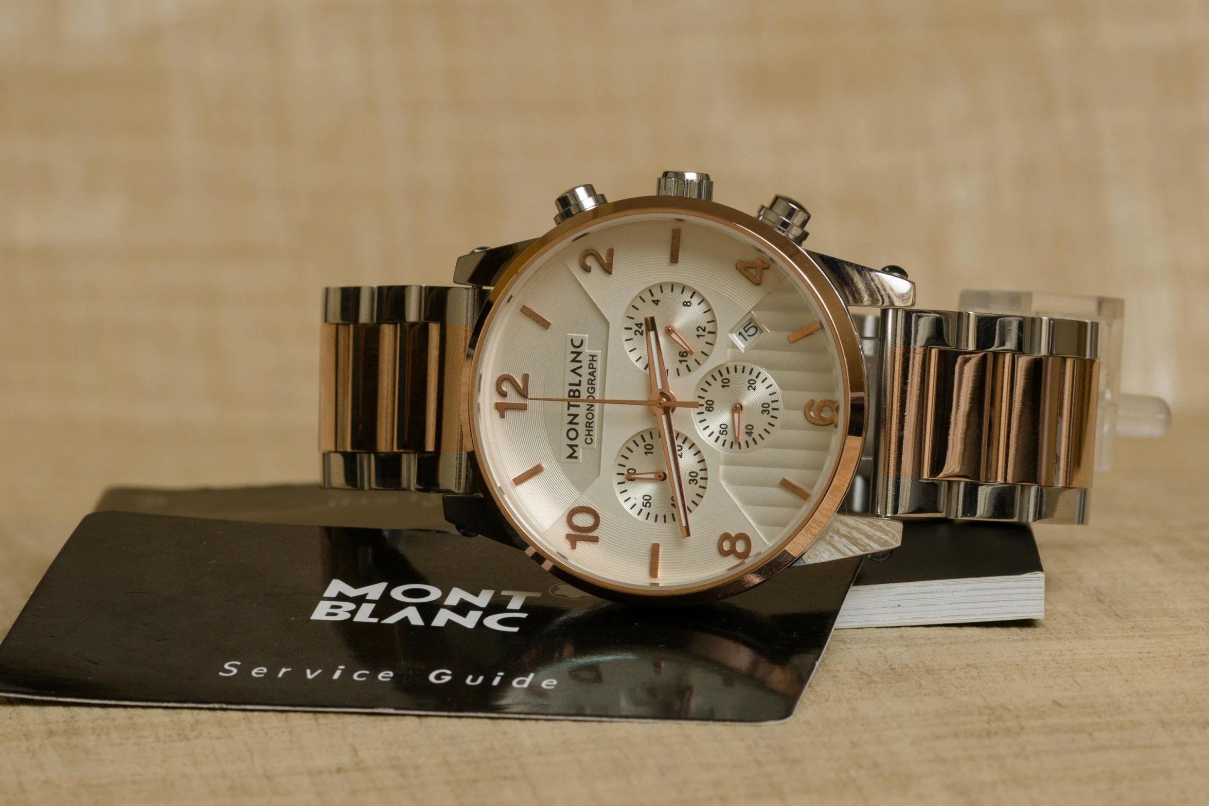 a close up of a watch on a table, by Romain brook, gradient brown to white, highly polished, high quality product image”, michael kors