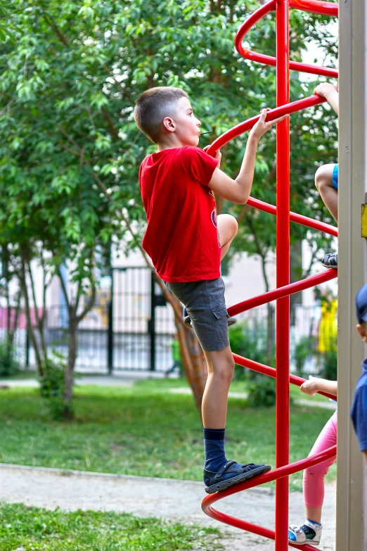 a group of children playing on a climbing frame, by Alexander Fedosav, shutterstock, wearing red shorts, school courtyard, 15081959 21121991 01012000 4k, alexey gurylev