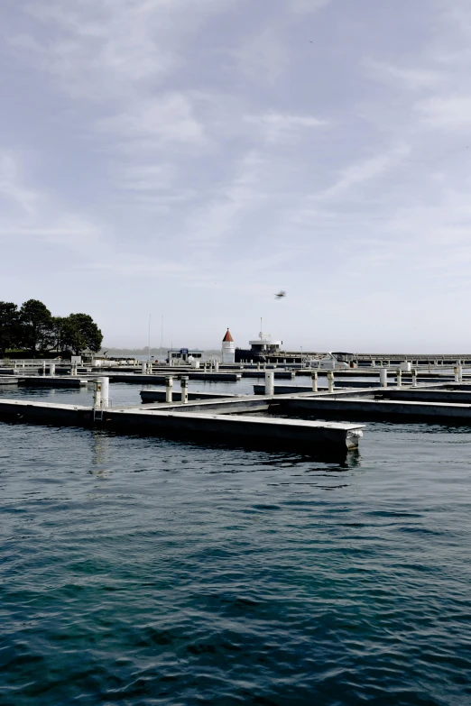 a number of boats in a body of water, boat dock, on the ocean, napa, deep clear pools of water