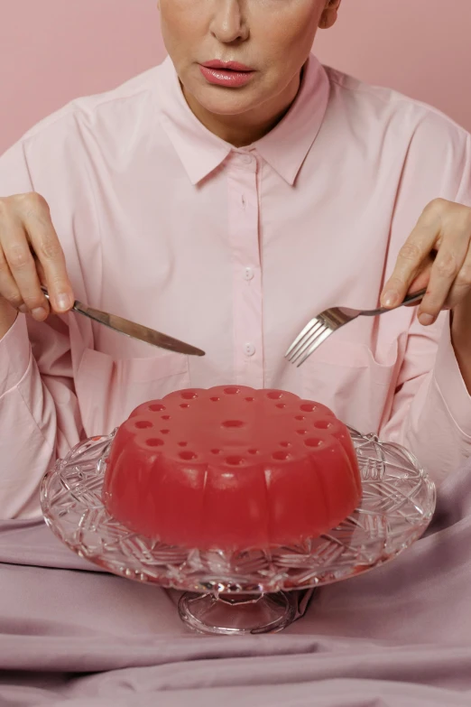 a woman cutting a cake with a knife and fork, an album cover, by Elsa Bleda, plasticien, jelly, mukbang, pink angry bubble, unedited