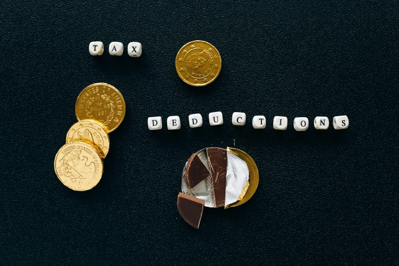 a piece of chocolate sitting on top of a pile of coins, by Julia Pishtar, pexels contest winner, hyperrealism, text morphing into objects, golden ration, ergodox, fairy tale