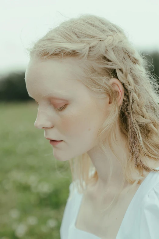 a woman in a white dress standing in a field, an album cover, inspired by Julia Margaret Cameron, unsplash, renaissance, albino skin, close - up profile face, evanna lynch, soft portrait shot 8 k