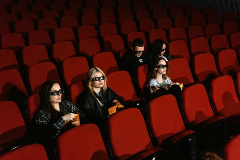 a group of people sitting in a movie theater, a hologram, by Julia Pishtar, shutterstock, digital sunglasses, hyperrealism photography, trending on mentalray, set photo