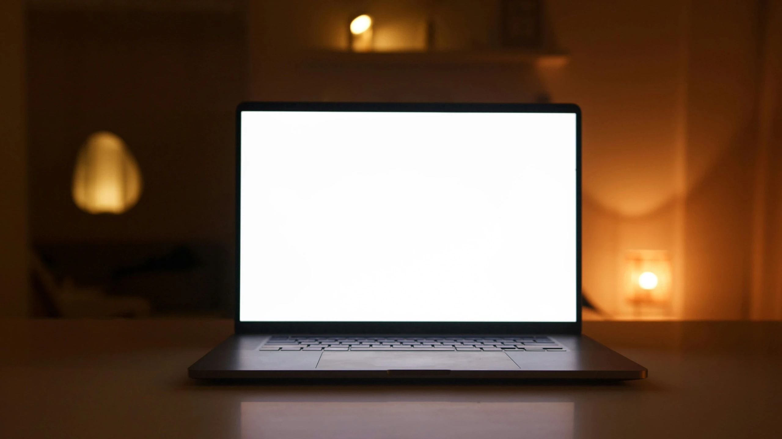 a laptop computer sitting on top of a table, pexels, glowing white face, single light, rectangle, large screen