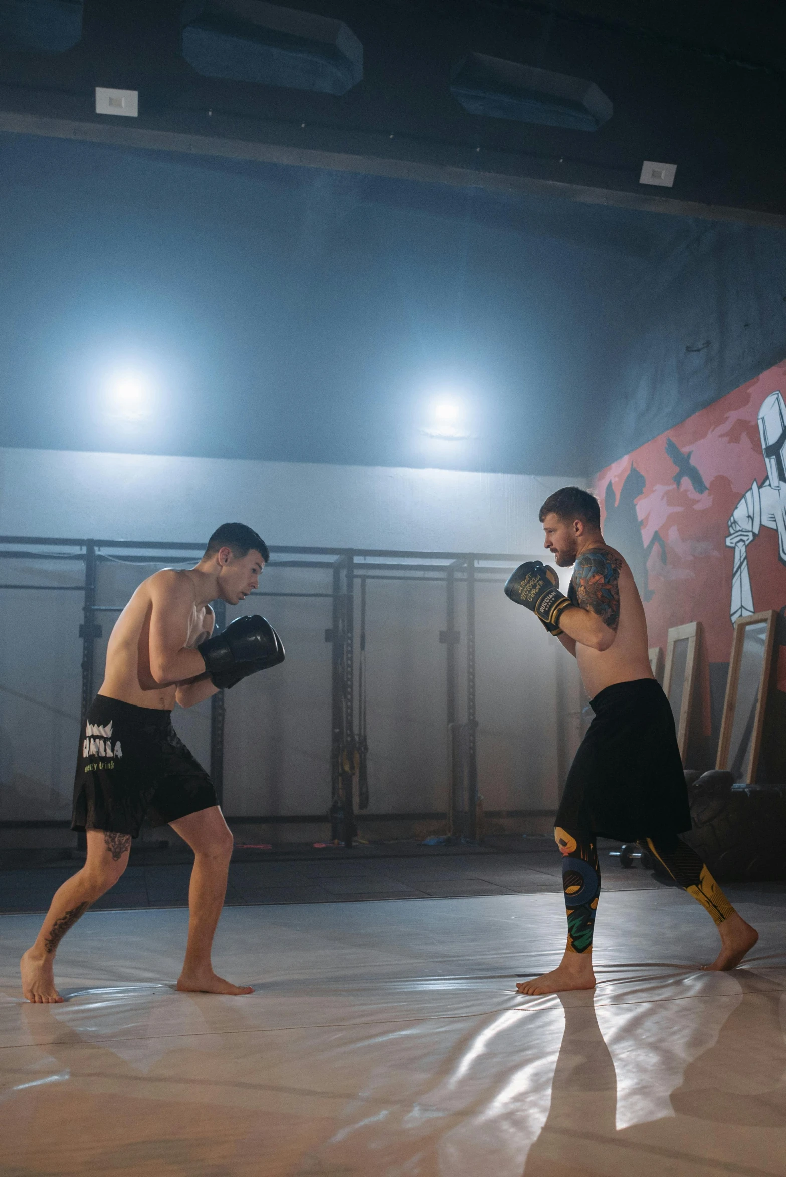 a couple of men that are standing in the dirt, boxing ring, in a dojo, wētā fx, action with run and fight