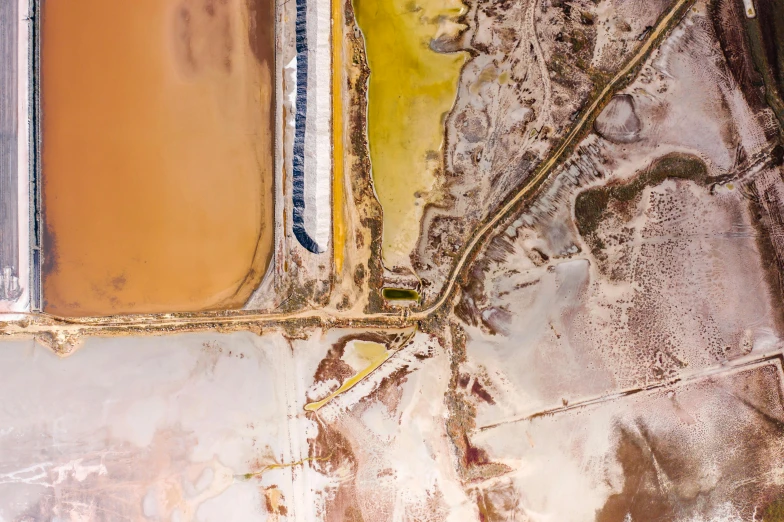 an aerial view of a large body of water, by Lee Loughridge, unsplash contest winner, renaissance, mining, coloured photo, thumbnail, rural wastelands