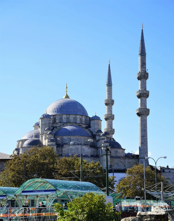 the blue mosque in the middle of the city, an album cover, pexels contest winner, clear blue sky, square, ((blue)), blue gray