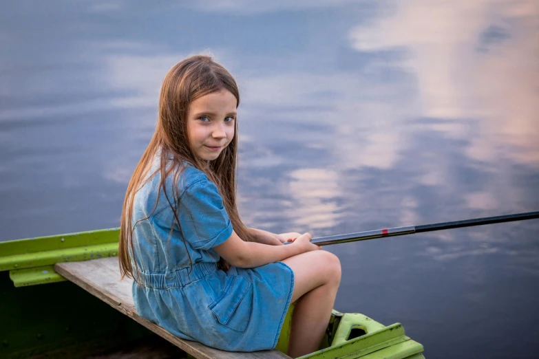 a little girl that is sitting in a boat, a picture, pixabay contest winner, paul barson, fishing pole, avatar image, model posing