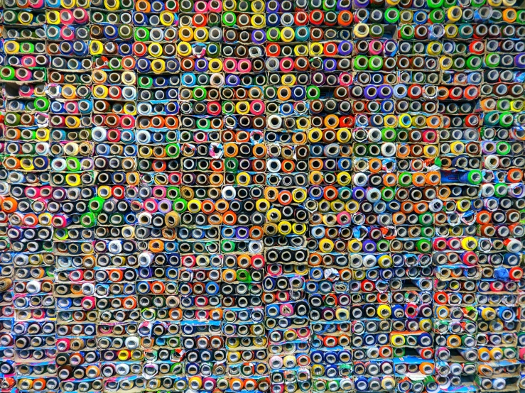 a pile of colored pencils stacked on top of each other, a mosaic, inspired by Andreas Gursky, maximalism, skateboard art, hundreds of eyes, taken with sony alpha 9, iphone detailed photo