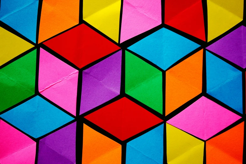 a close up of an origami piece of paper, inspired by Buckminster Fuller, unsplash, cubo-futurism, happy colours, square shapes, kites, fluorescent