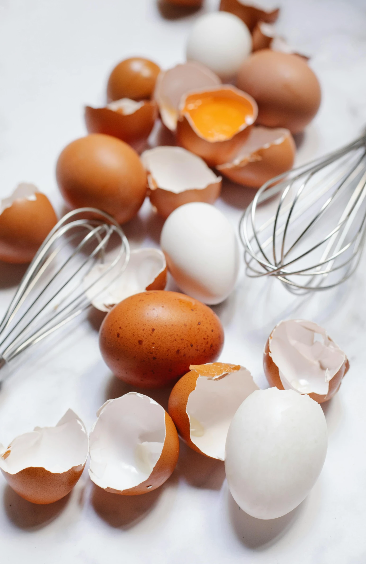 a bunch of eggs and a whisk on a table, profile image, uncropped, crackles, hard boiled