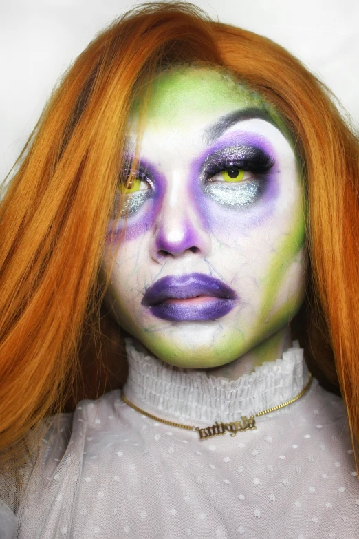 a close up of a person with orange hair, an album cover, inspired by Daphne McClure, trending on pexels, lowbrow, monster high makeup, grey alien, zendaya as she-hulk, spooky halloween theme