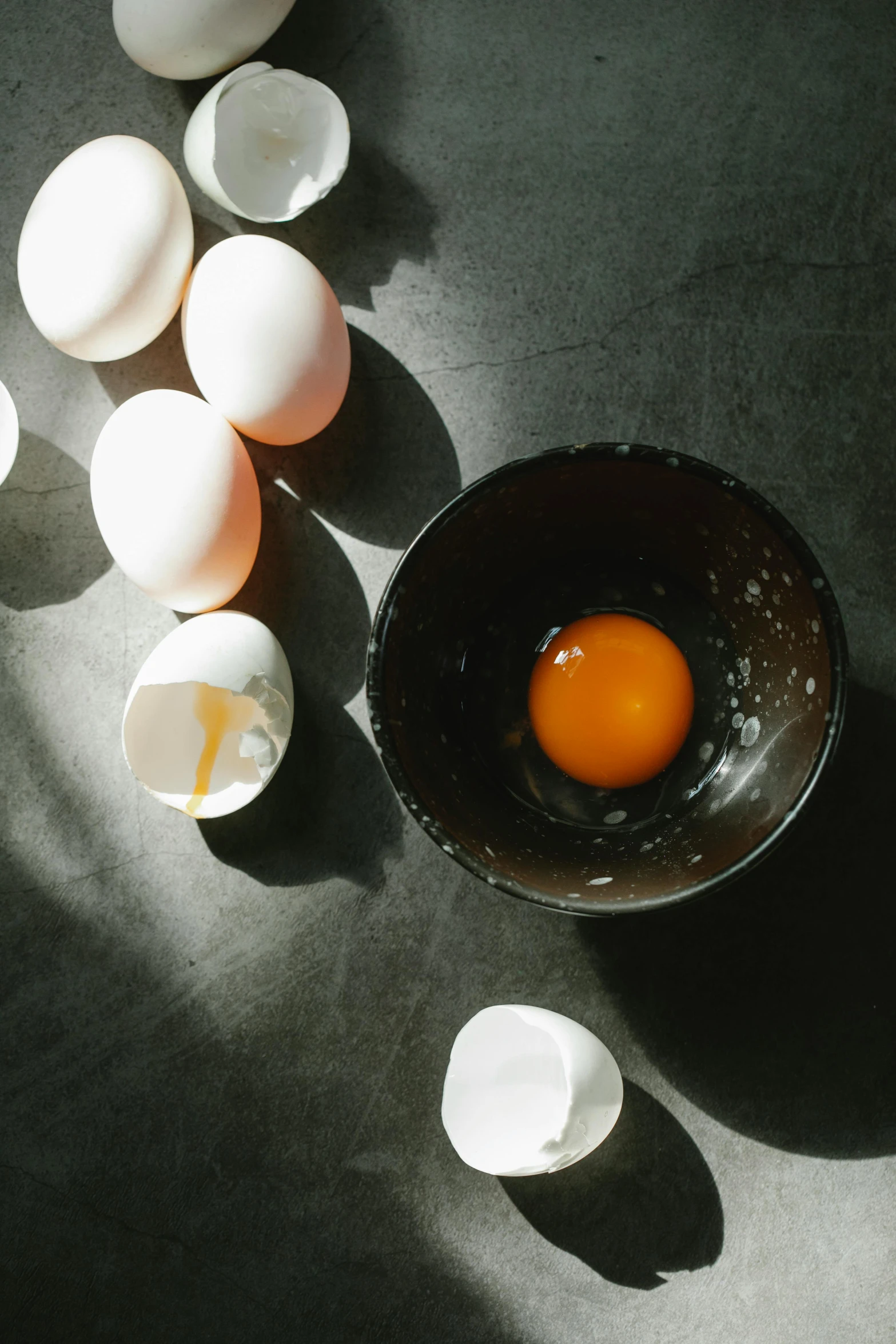 a bowl of eggs sitting on top of a table, trending on unsplash, renaissance, light and dark, high quality product image”, multiple stories, high angle close up shot