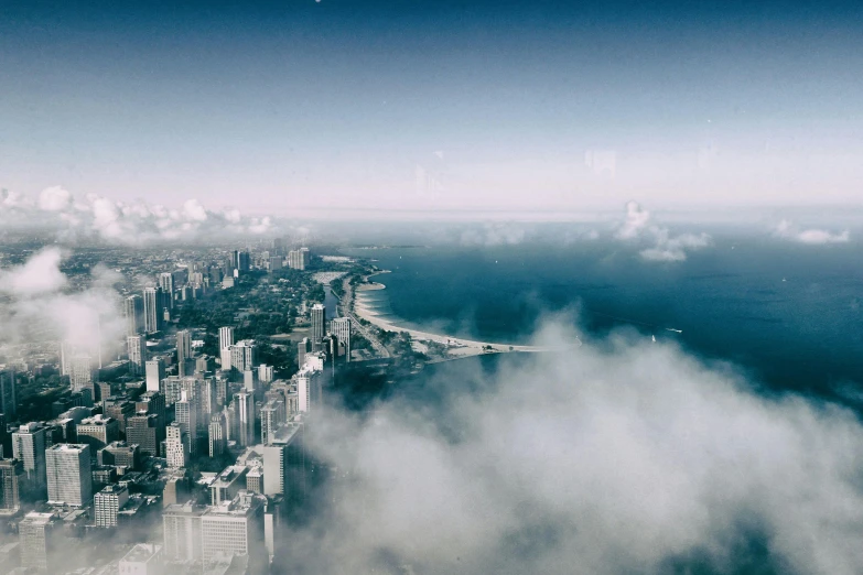 an aerial view of a city surrounded by clouds, pexels contest winner, hurufiyya, chicago skyline, a photo of the ocean, 15081959 21121991 01012000 4k, illinois vaporwave