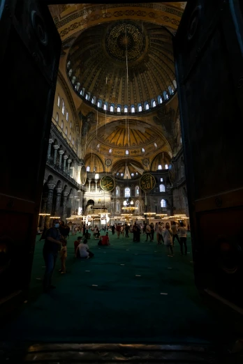 a group of people standing inside of a building, with great domes and arches, 8k)), istanbul, tons of rooms