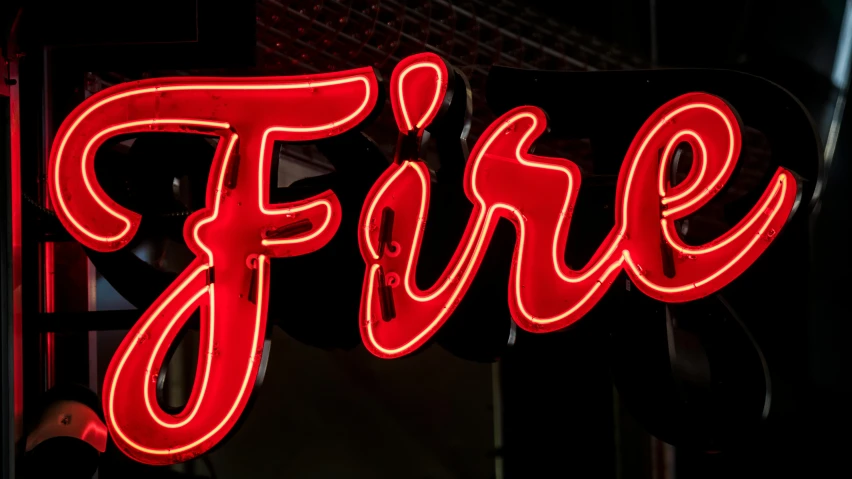 a neon fire sign hanging from the side of a building, by Dan Frazier, pexels contest winner, fine art, fine details. red, fry, flirting, commercial banner