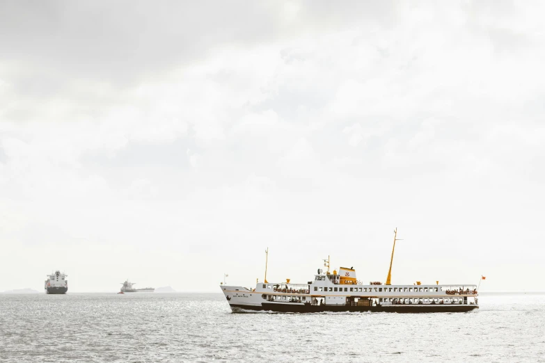 a couple of boats that are in the water, unsplash, sea queen, fallout style istanbul, 2000s photo, bjarke ingels