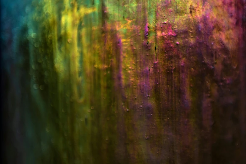 a close up of a colorful painting on a wall, inspired by Richter, unsplash, gold green and purple colors”, wet metal reflections, ethereal curtain, paul barson