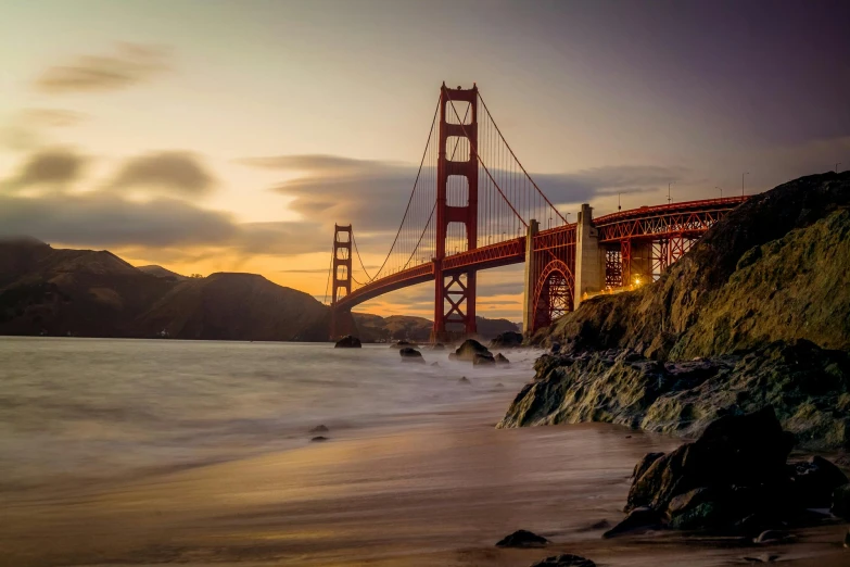 a view of the golden gate bridge from the beach, pexels contest winner, medium format, golden hour 8k, profile picture 1024px, multiple stories