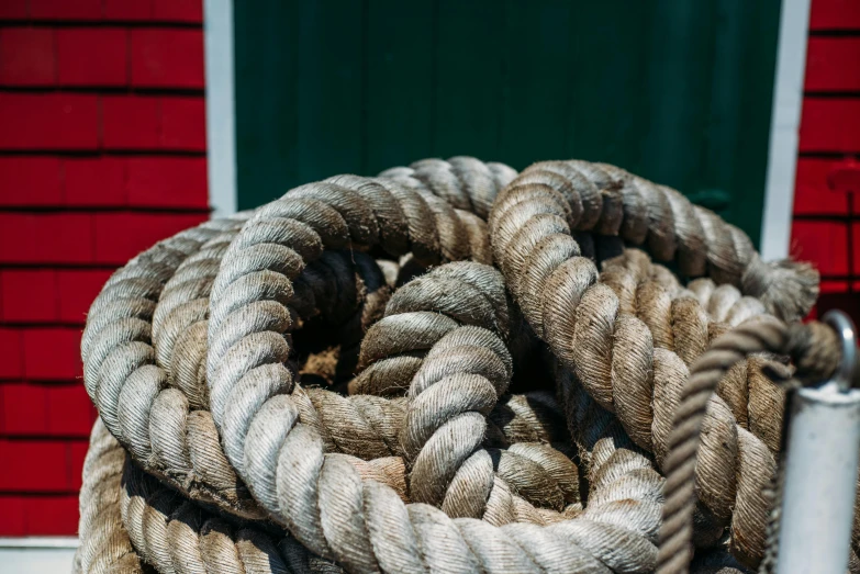 a close up of a rope on a pole, by Nina Hamnett, pexels contest winner, vessels, various sizes, high detail photograph, instagram post