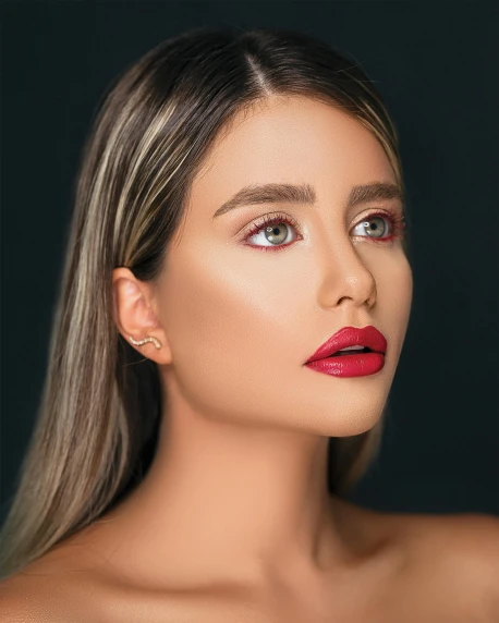 a woman with long hair and red lipstick, a colorized photo, inspired by Hedi Xandt, trending on instagram, tanned ameera al taweel, detailed product image, looking off to the side, asher duran