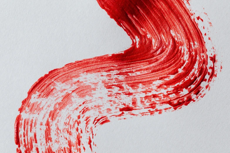 a close up of a piece of paper with red paint on it, inspired by Shōzō Shimamoto, trending on pexels, blood lines, on grey background, bloodwave, brush paint