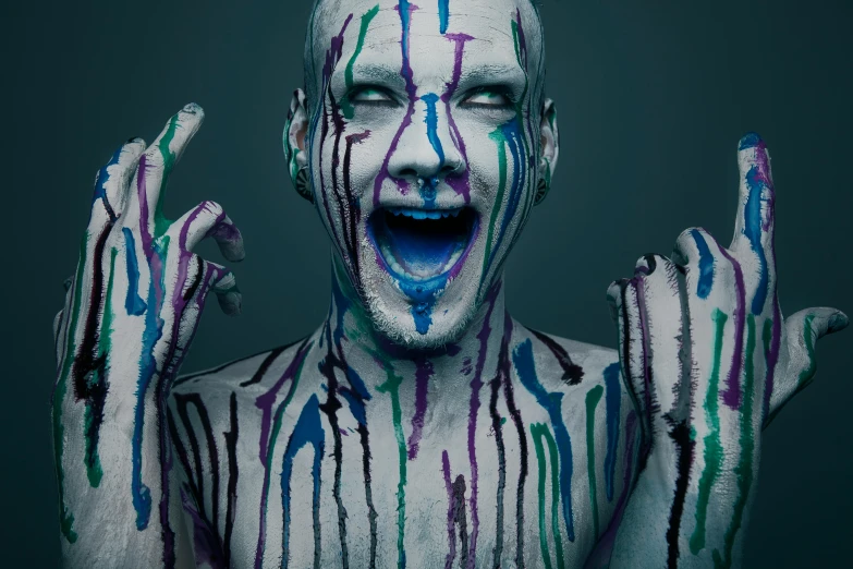 a close up of a person with paint on their body, an album cover, inspired by Alberto Seveso, pexels contest winner, shock art, portrait of voldemort, happy colors dariusz zawadzki, screaming fashion model face, a portrait of an android