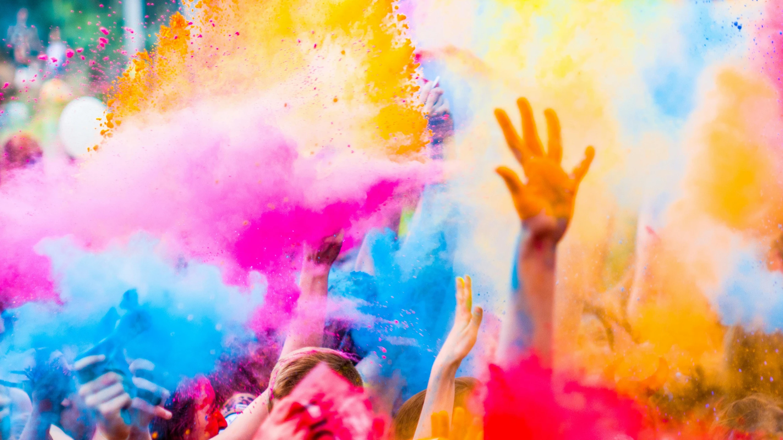 a group of people throwing colored powder into the air, a picture, by Julia Pishtar, shutterstock, happy colors, instagram post, full colour print, colorised