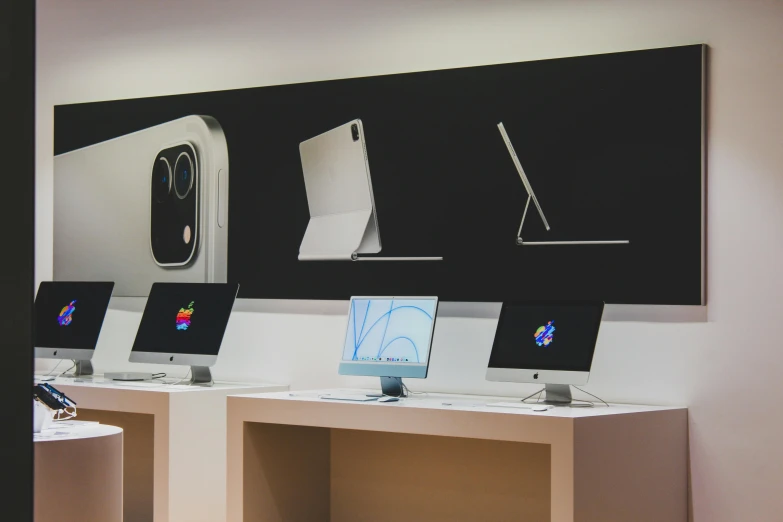 a row of computers sitting on top of a table, apple - store, home display, rituals, thumbnail