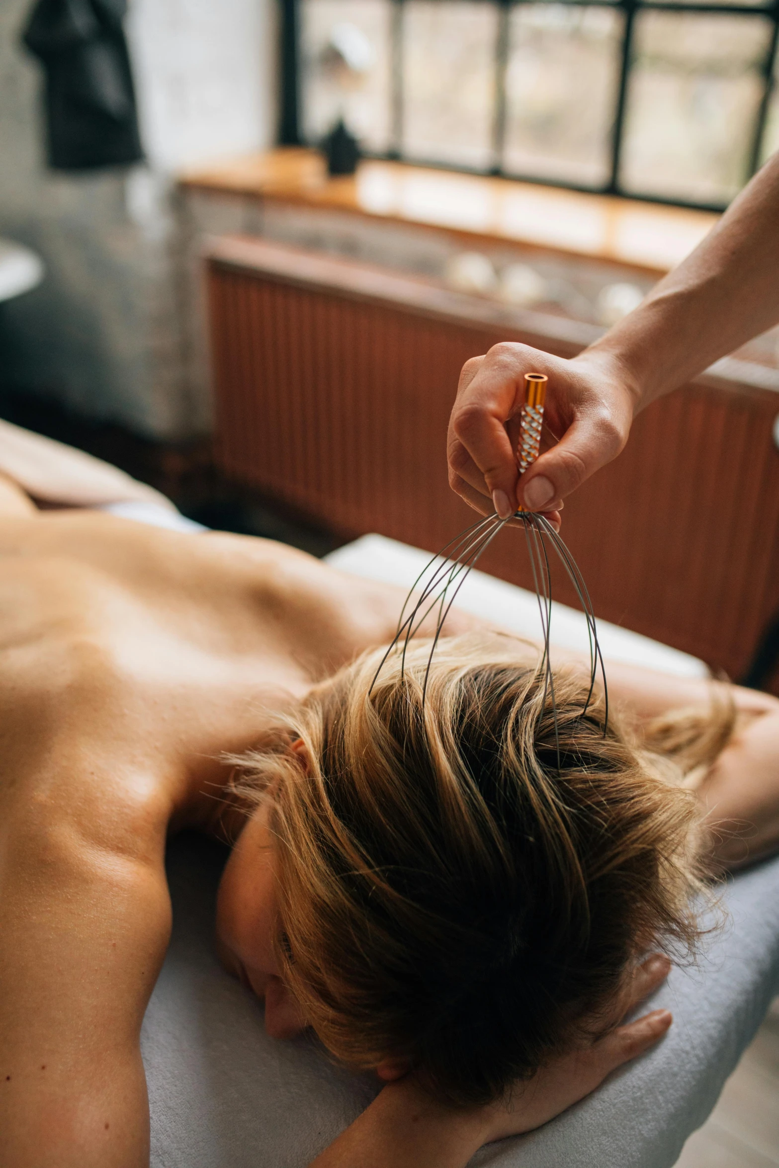 a woman getting a massage at a spa, by Jakob Gauermann, unsplash, wrapped in wires and piones, bedhead, hard clay, victoria siemer