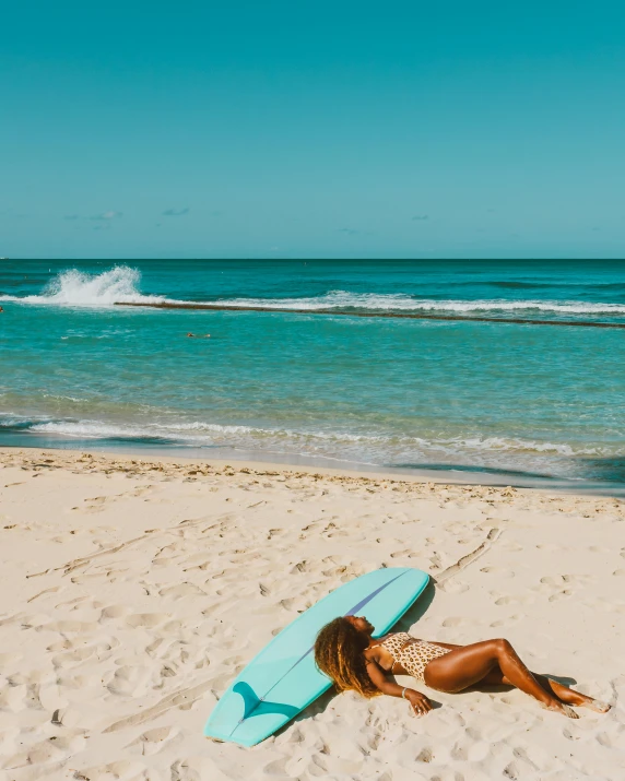 a woman laying on a beach with a surfboard, by Hannah Tompkins, pexels contest winner, carribean turquoise water, :: madison beer, on a hot australian day, slide show