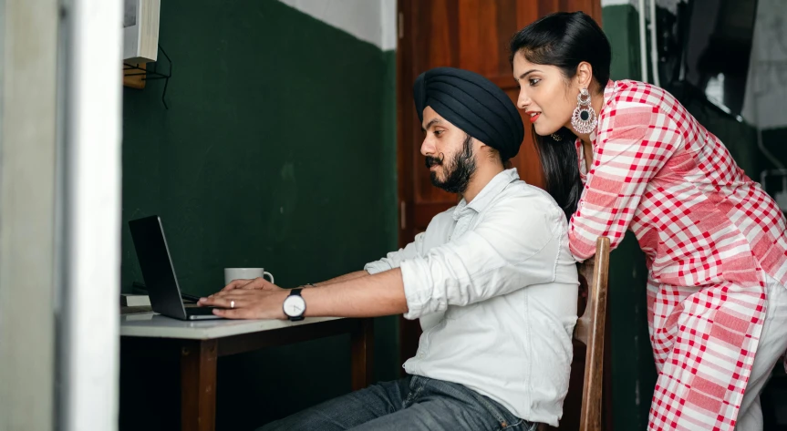 a man and a woman sitting in front of a laptop, pexels contest winner, indian, sitting in the classroom, profile image, thumbnail