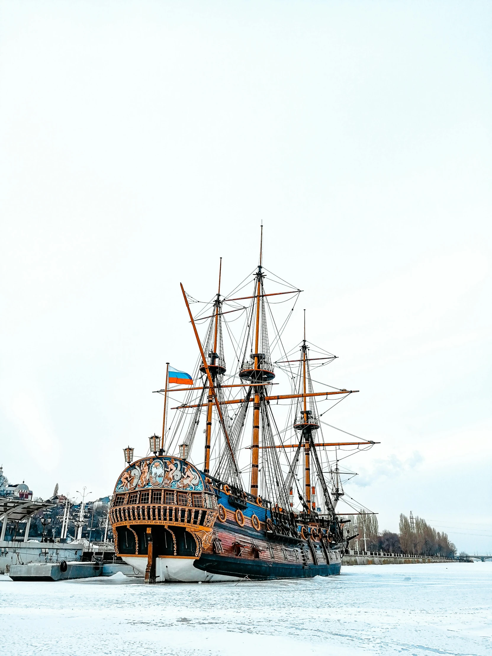 a tall ship sitting on top of a body of water, a photo, inspired by Vasily Surikov, pexels contest winner, 🚿🗝📝