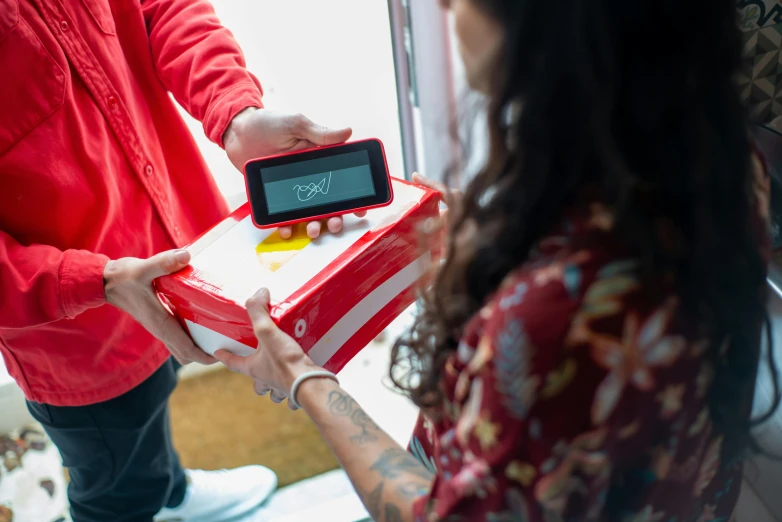 a woman handing a gift to a man in a red shirt, pexels contest winner, graffiti, digital pong screen, avatar image, product shot, middle shot