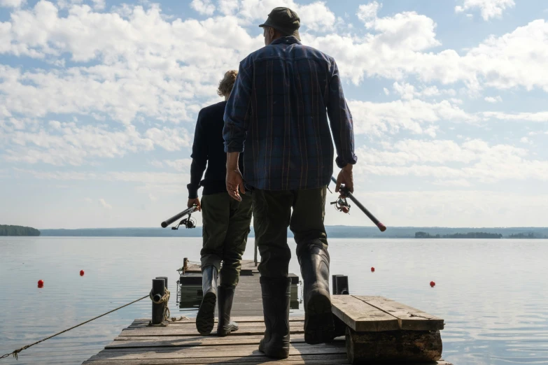 a couple of men standing on top of a wooden dock, hunters gear, nordic summer, father figure image, production still