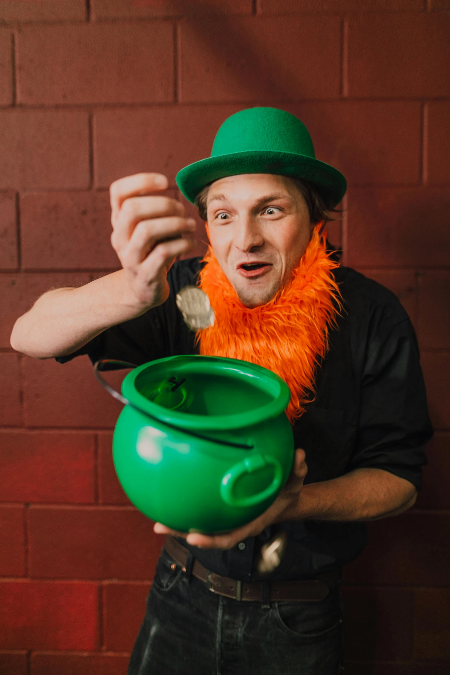 a man in a green hat holding a green pot, green and orange theme, vaudevillian, lachlan bailey, bubbling cauldron