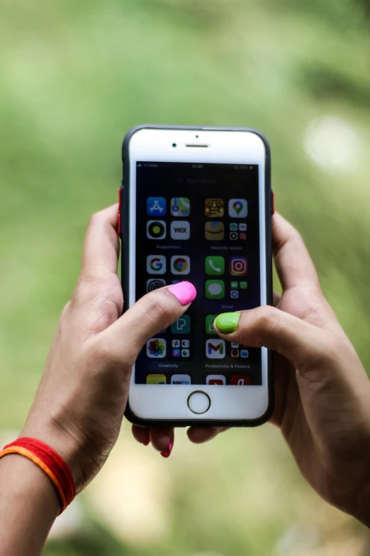 a close up of a person holding a cell phone, by Robbie Trevino, square, lgbtq, an apple, 15081959 21121991 01012000 4k