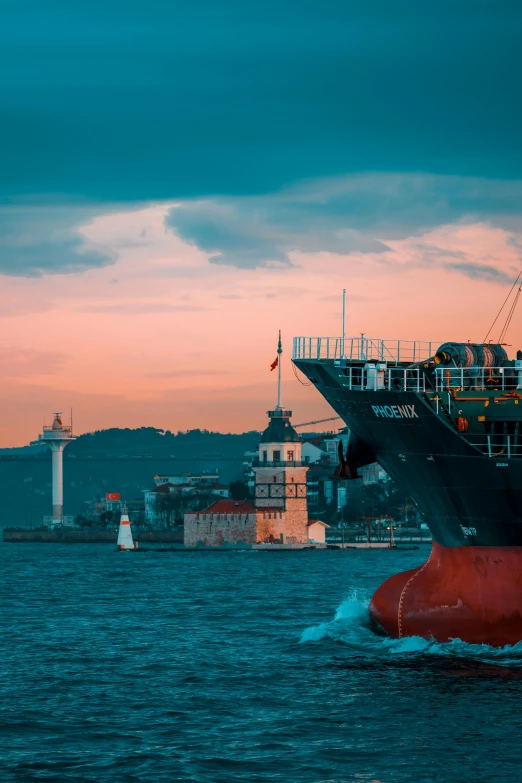 a large boat floating on top of a body of water, istanbul, slide show, industries, at golden hour