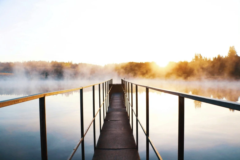 a dock that is next to a body of water, pexels contest winner, light mist, minna sundberg, waking up, instagram post