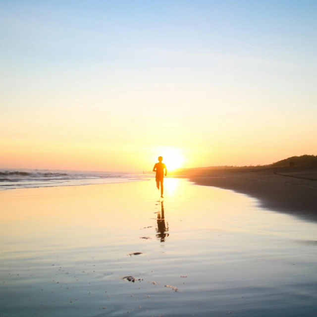 a person walking on a beach at sunset, on the ocean, australian beach, reflecting, running