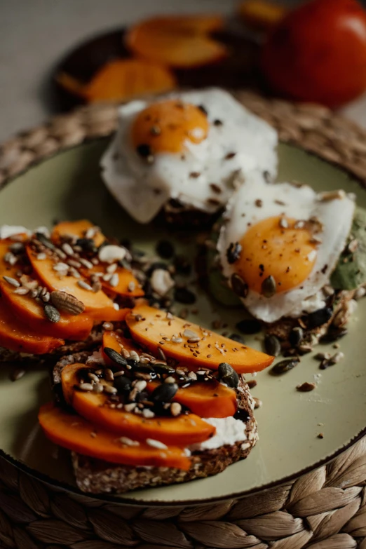 a plate that has some food on it, by Daniel Seghers, pexels, orange grey white, abundant fruition seeds, eggs, luscious with sesame seeds