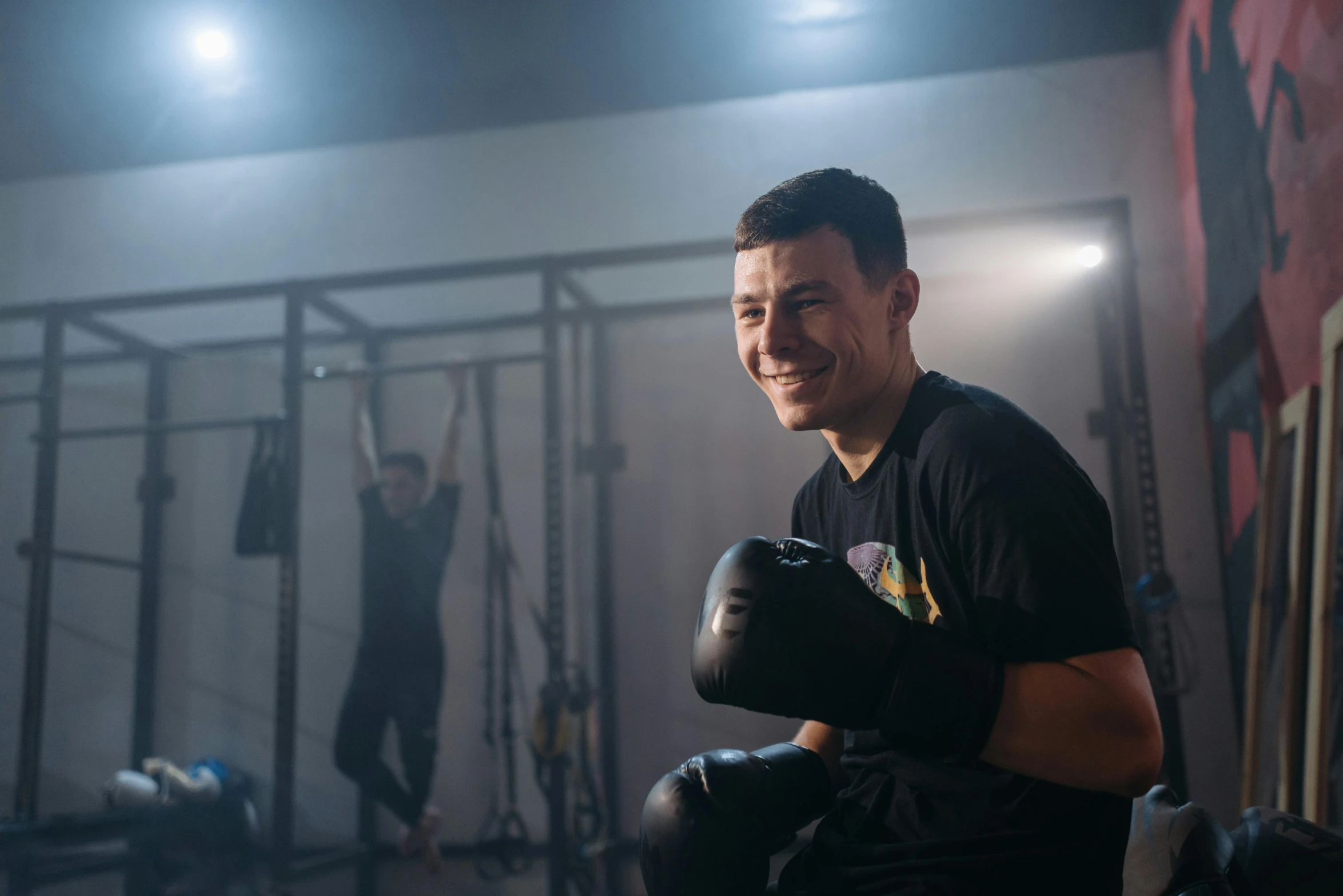 a man wearing boxing gloves in a gym, a portrait, by Emma Andijewska, pexels contest winner, expressing joy, avatar image, khabib, julian ope