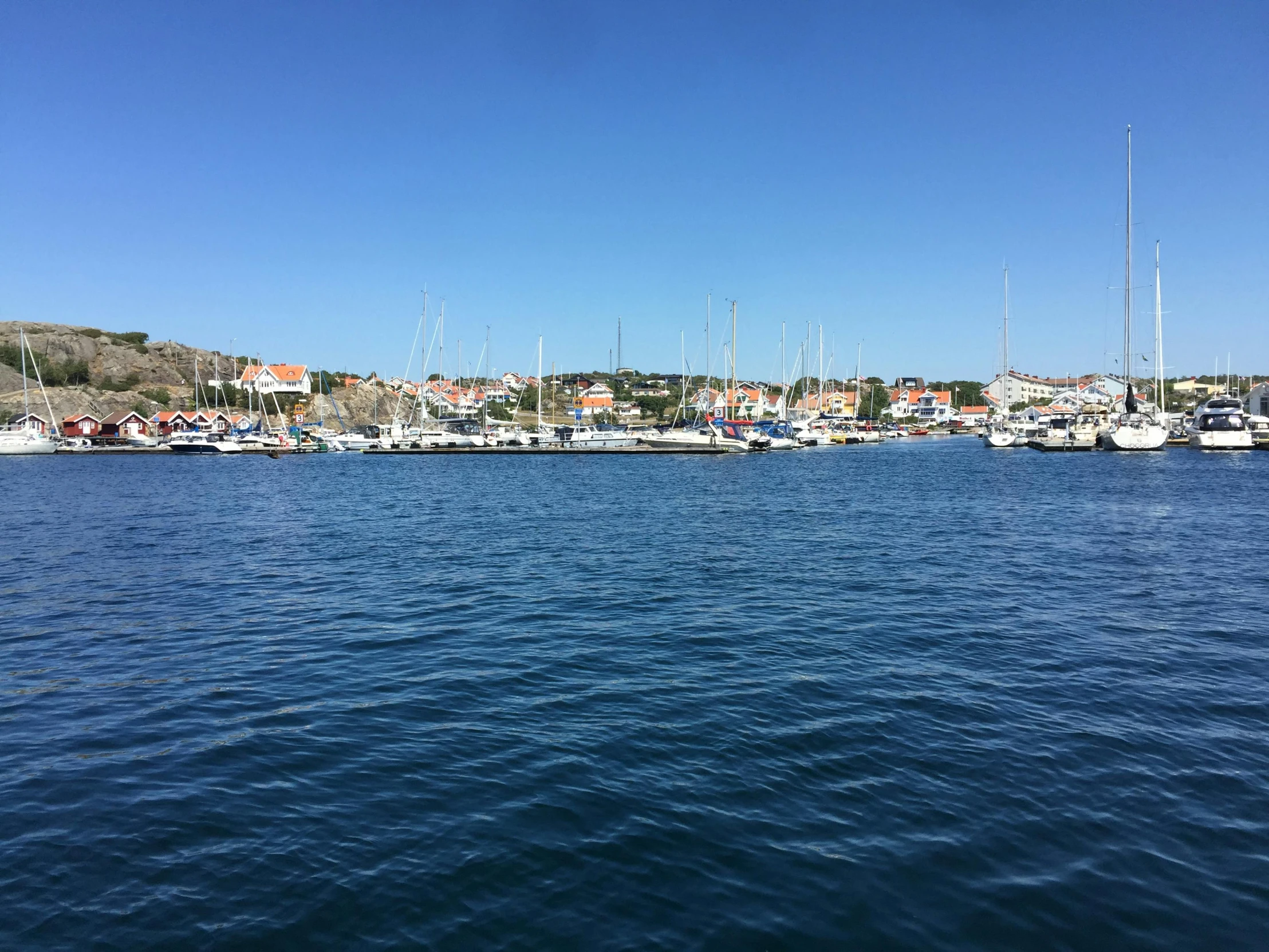 a large body of water filled with lots of boats, a picture, inspired by Wilhelm Marstrand, happening, seaside, low quality photo, square, 8 k 4 k