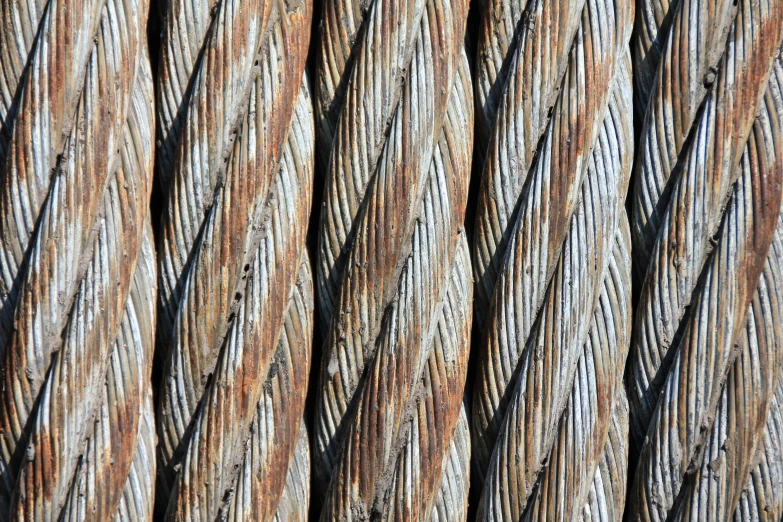 a close up view of a piece of wood, inspired by W. Lindsay Cable, pexels, steel plating, stacked image, braided cable, seamless texture