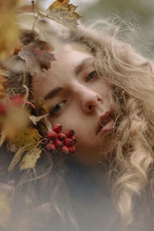 a woman with a bunch of leaves on her head, inspired by Elsa Bleda, trending on pexels, renaissance, curly blond hair, gif, video, perky woman made of petals