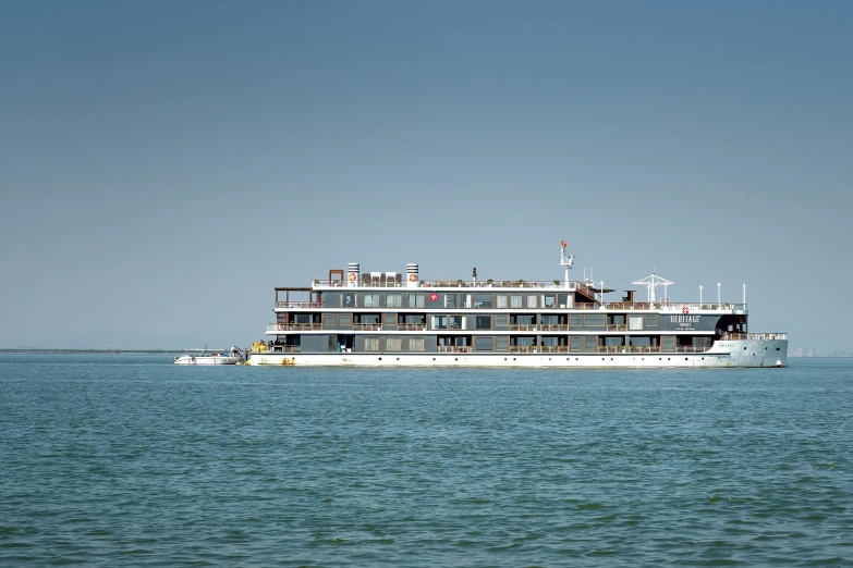 a large boat floating on top of a body of water, danube school, profile image, conde nast traveler photo, fan favorite, on the sea