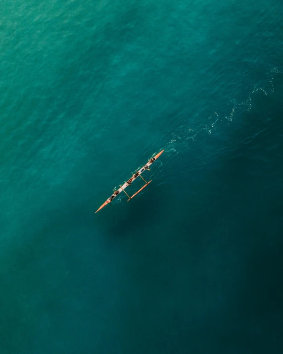 a couple of people riding on top of a boat in the ocean, unsplash contest winner, minimalism, bird\'s eye view, rowing boat, manly, tournament